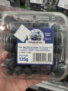 GLOBALG.A.P. certified berries in packaging labelled with GGN good agriculture practice